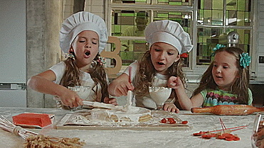 children acting as a chef to make some cake gif