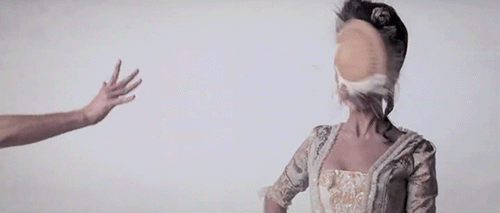 person throwing pie to a woman's face gif